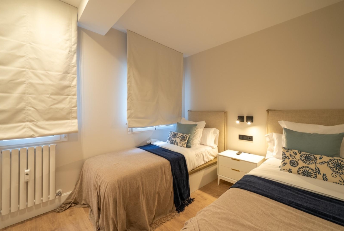 VERVOLGDE APPARTEMENT MET TERRAS EN PARKEREN