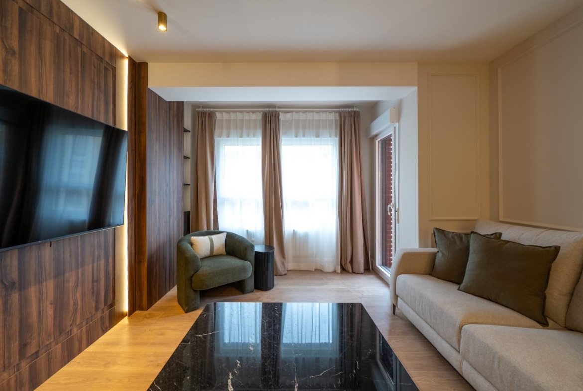 VERVOLGDE APPARTEMENT MET TERRAS EN PARKEREN