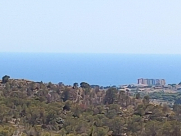 Encantadora Casa Adosada con Impresionantes Vistas al Mar en Balcón de Finestrat
