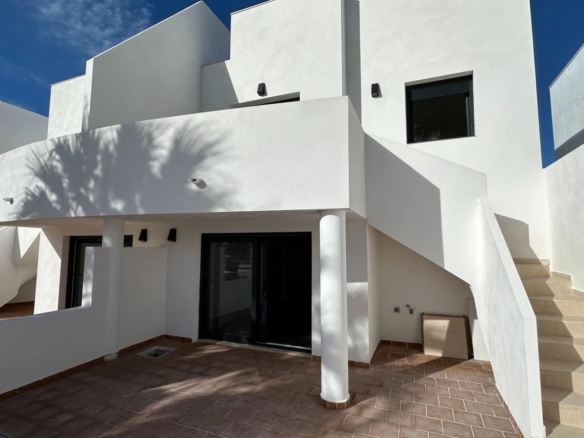 Exclusive townhouses in Oliva Nova: style, comfort, and sea just 500 m away