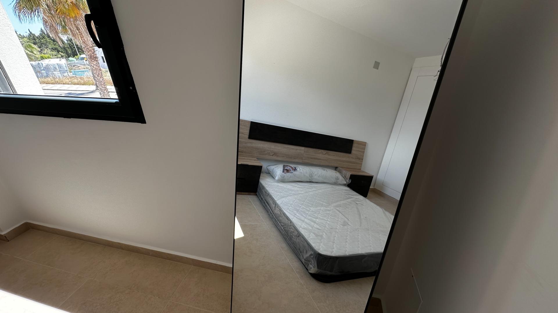 2-10-340 Exclusive townhouses in Oliva Nova: style, comfort, and sea just 500 m away