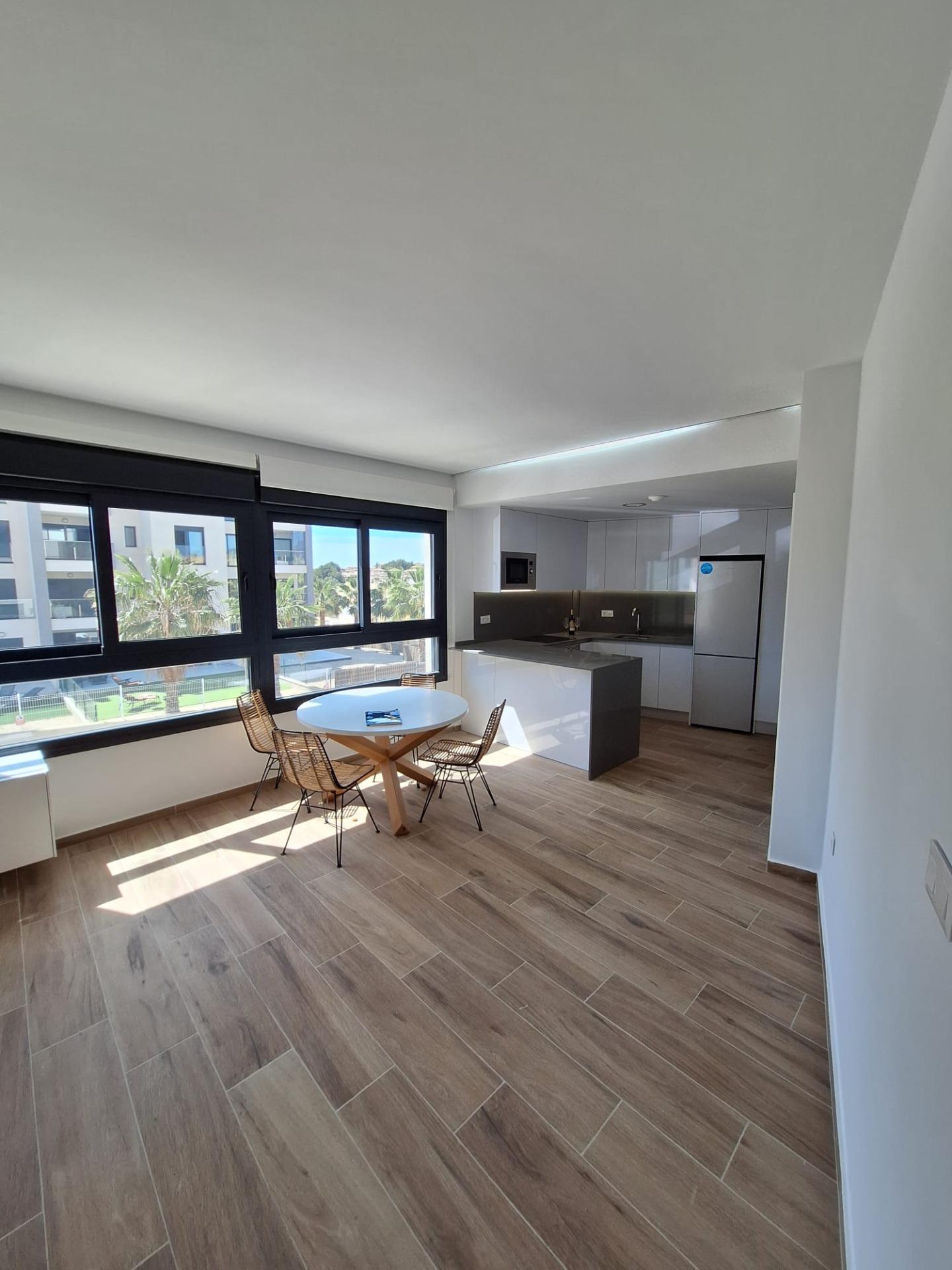 Nieuwbouw appartement in Villamartin met parkeerplaats en gemeenschappelijk zwembad