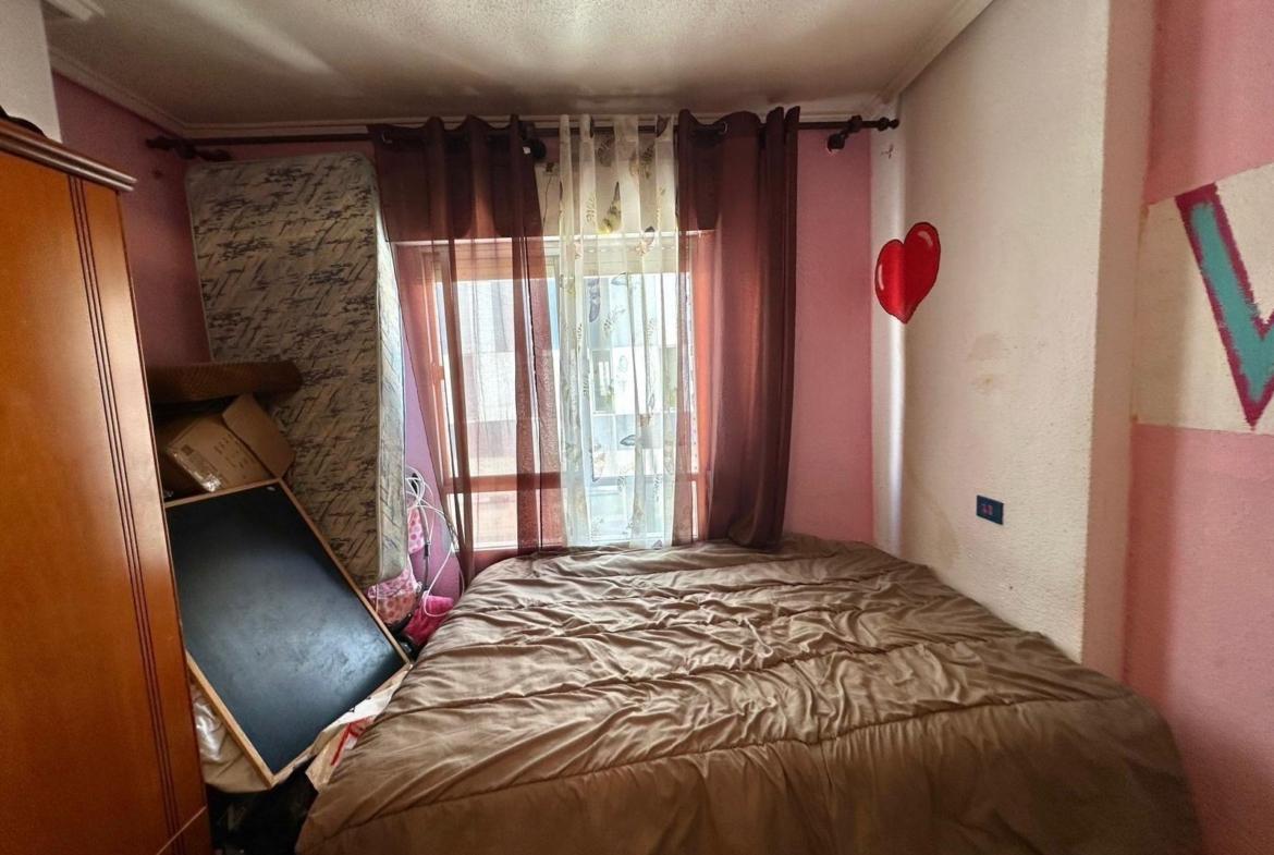 APPARTAMENTO A 450 DEL PUERTO DE TORREVIEJA. 2 DORM. 2 BAÑOS. TERRAZA AMPLIA. 76 M2.