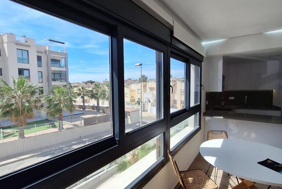 Nieuwbouw appartement in Villamartin met parkeerplaats en gemeenschappelijk zwembad