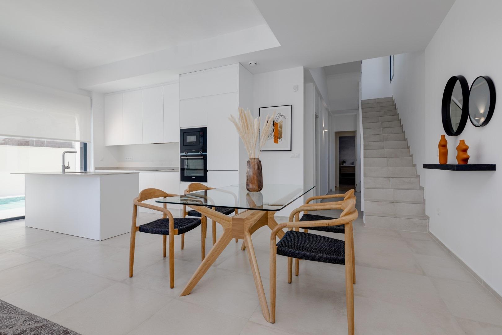 Luxury villas surrounded by green areas and golf courses