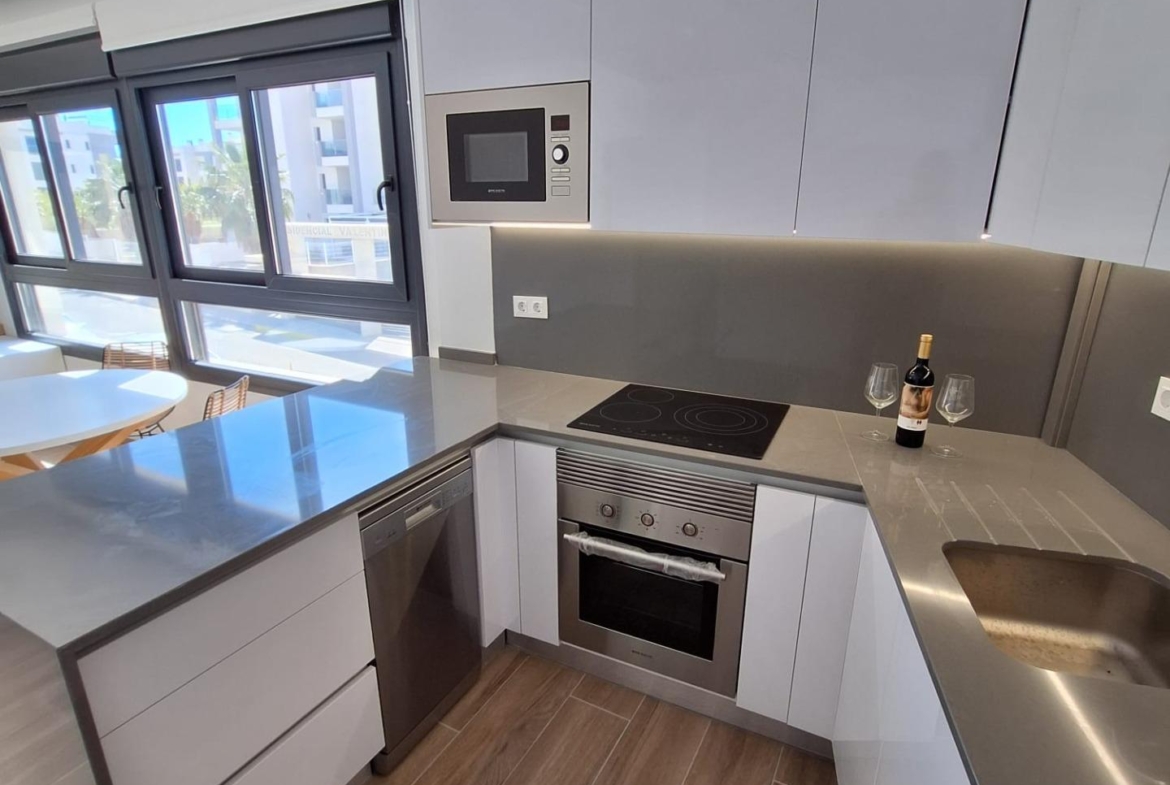 Nieuwbouw appartement in Villamartin met parkeerplaats en gemeenschappelijk zwembad