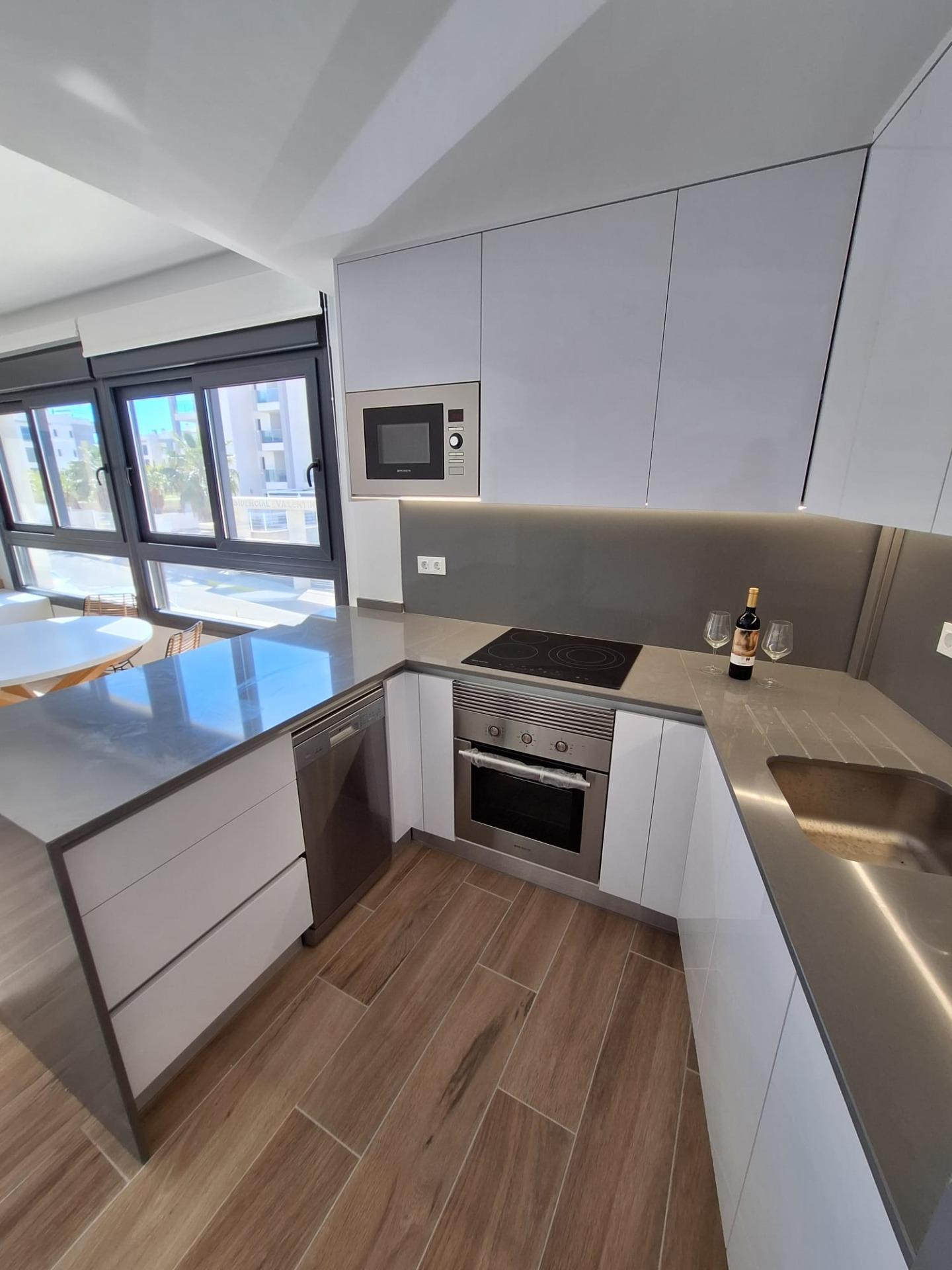 Nieuwbouw appartement in Villamartin met parkeerplaats en gemeenschappelijk zwembad