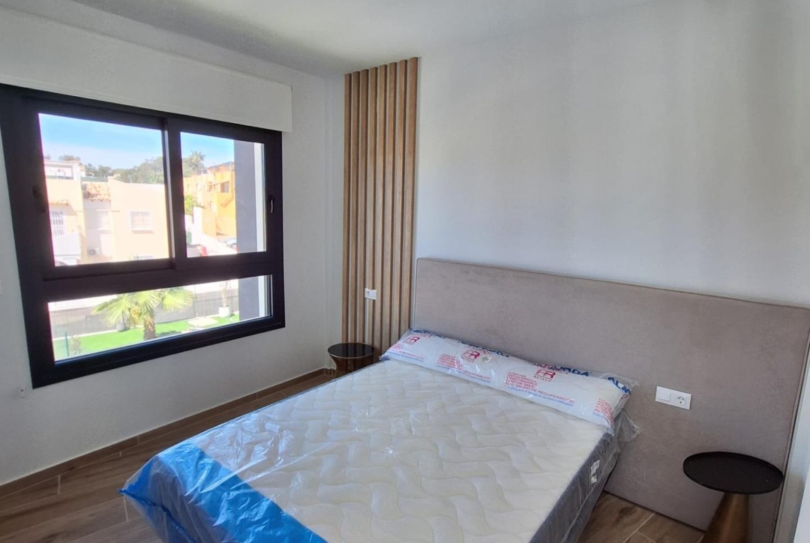 Nieuwbouw appartement in Villamartin met parkeerplaats en gemeenschappelijk zwembad