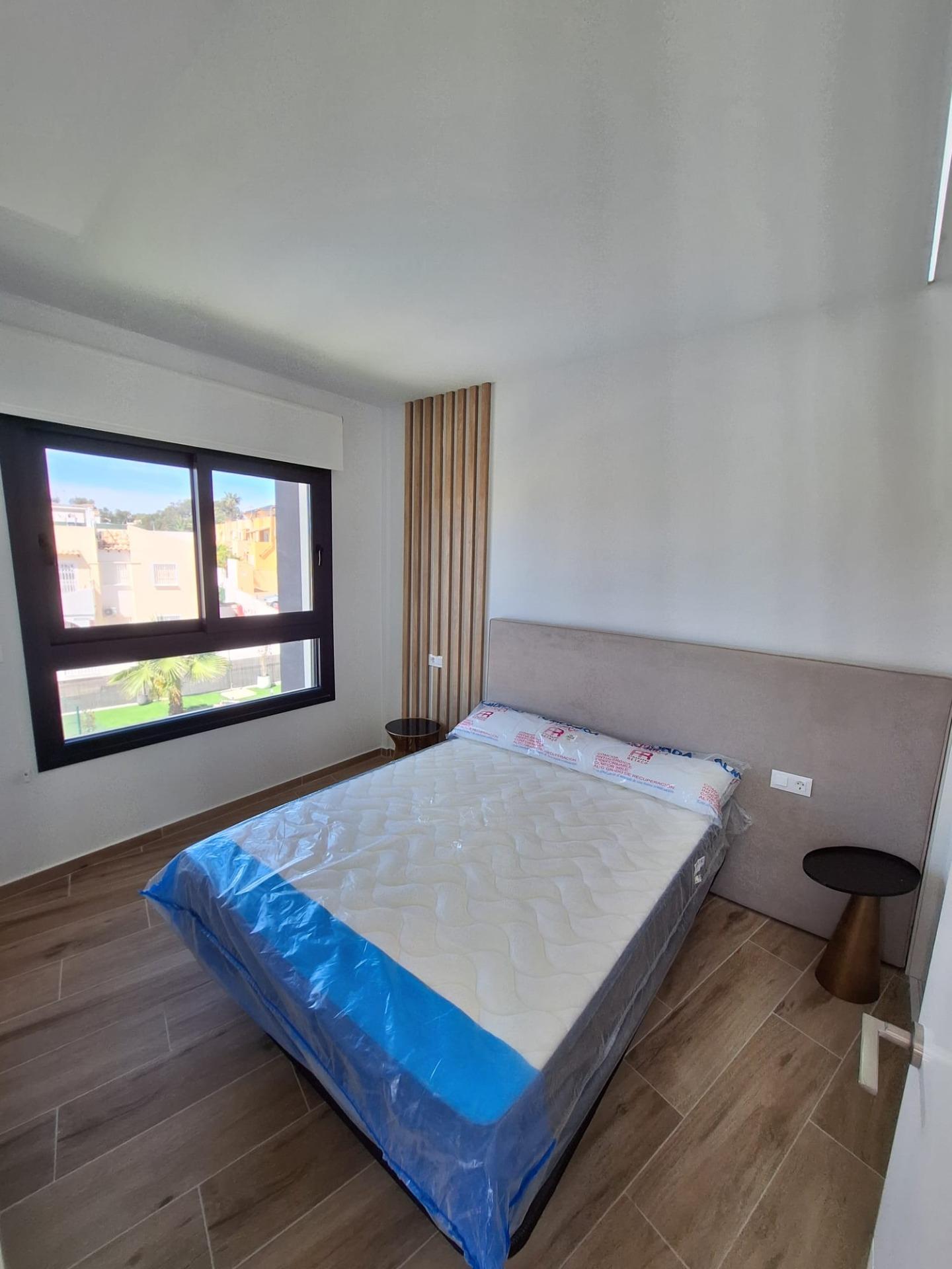 Nieuwbouw appartement in Villamartin met parkeerplaats en gemeenschappelijk zwembad