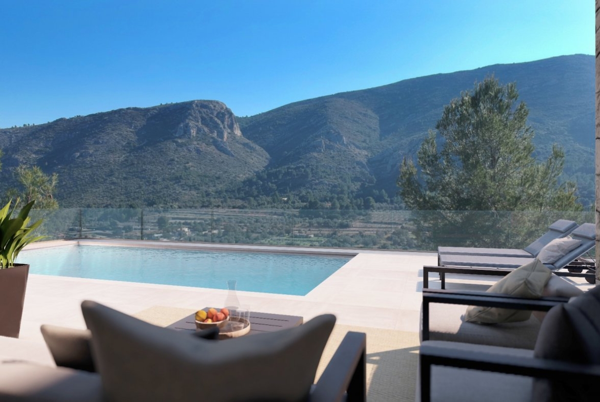 Villa con piscina y vistas al mar en Pedreguer