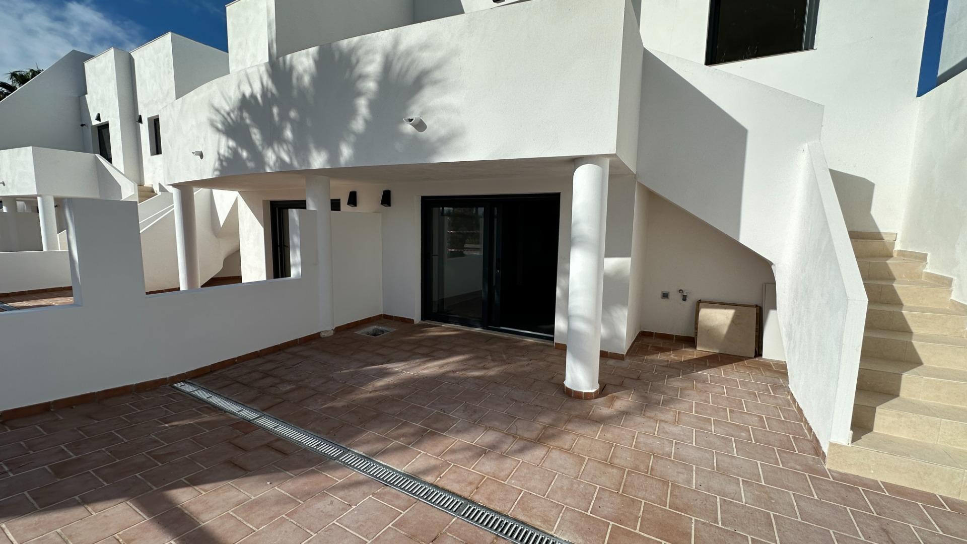 2-2-387 Exclusive townhouses in Oliva Nova: style, comfort, and sea just 500 m away