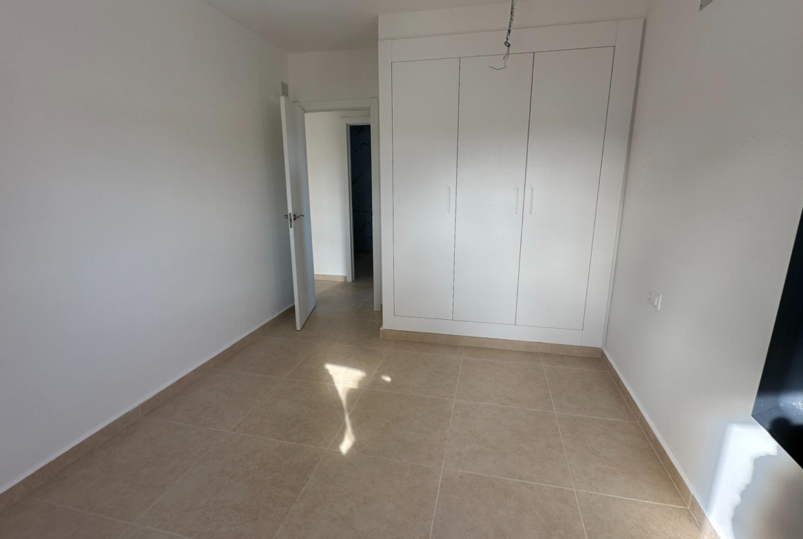 Exclusive townhouses in Oliva Nova: style, comfort, and sea just 500 m away