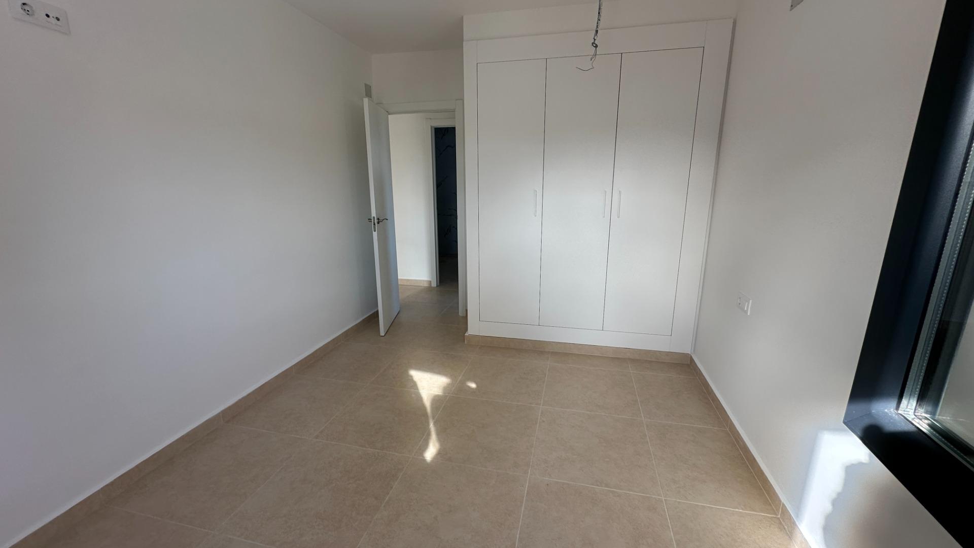 2-21-211 Exclusive townhouses in Oliva Nova: style, comfort, and sea just 500 m away