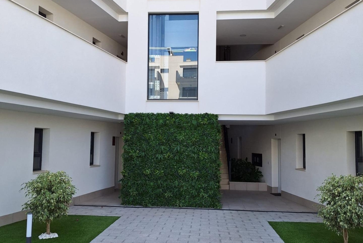 Nieuwbouw appartement in Villamartin met parkeerplaats en gemeenschappelijk zwembad