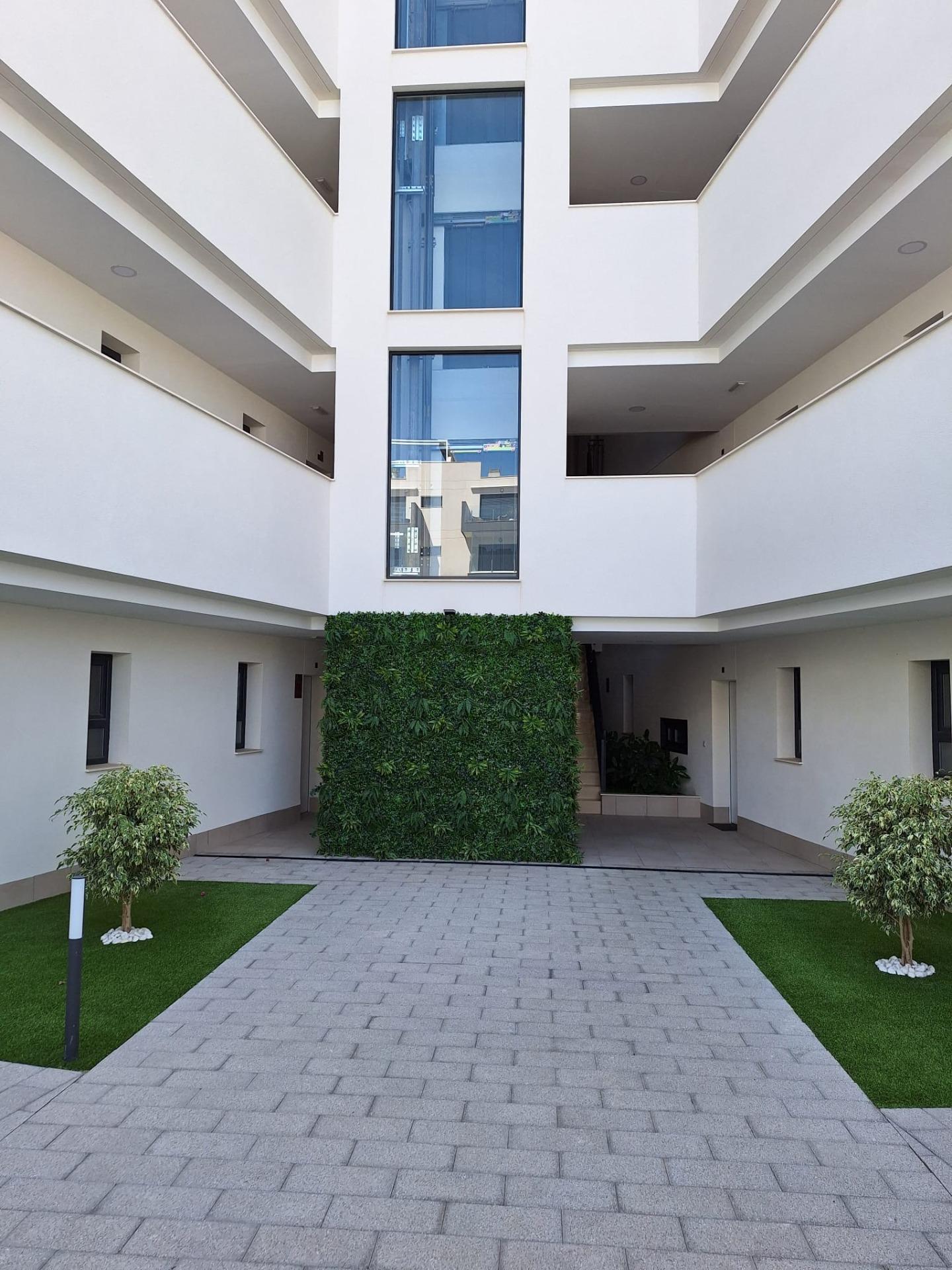 Nieuwbouw appartement in Villamartin met parkeerplaats en gemeenschappelijk zwembad