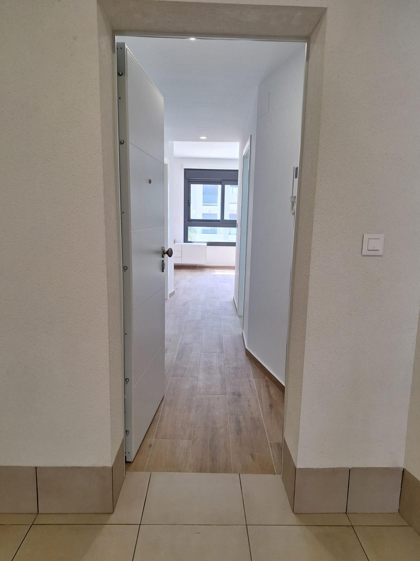 Nieuwbouw appartement in Villamartin met parkeerplaats en gemeenschappelijk zwembad