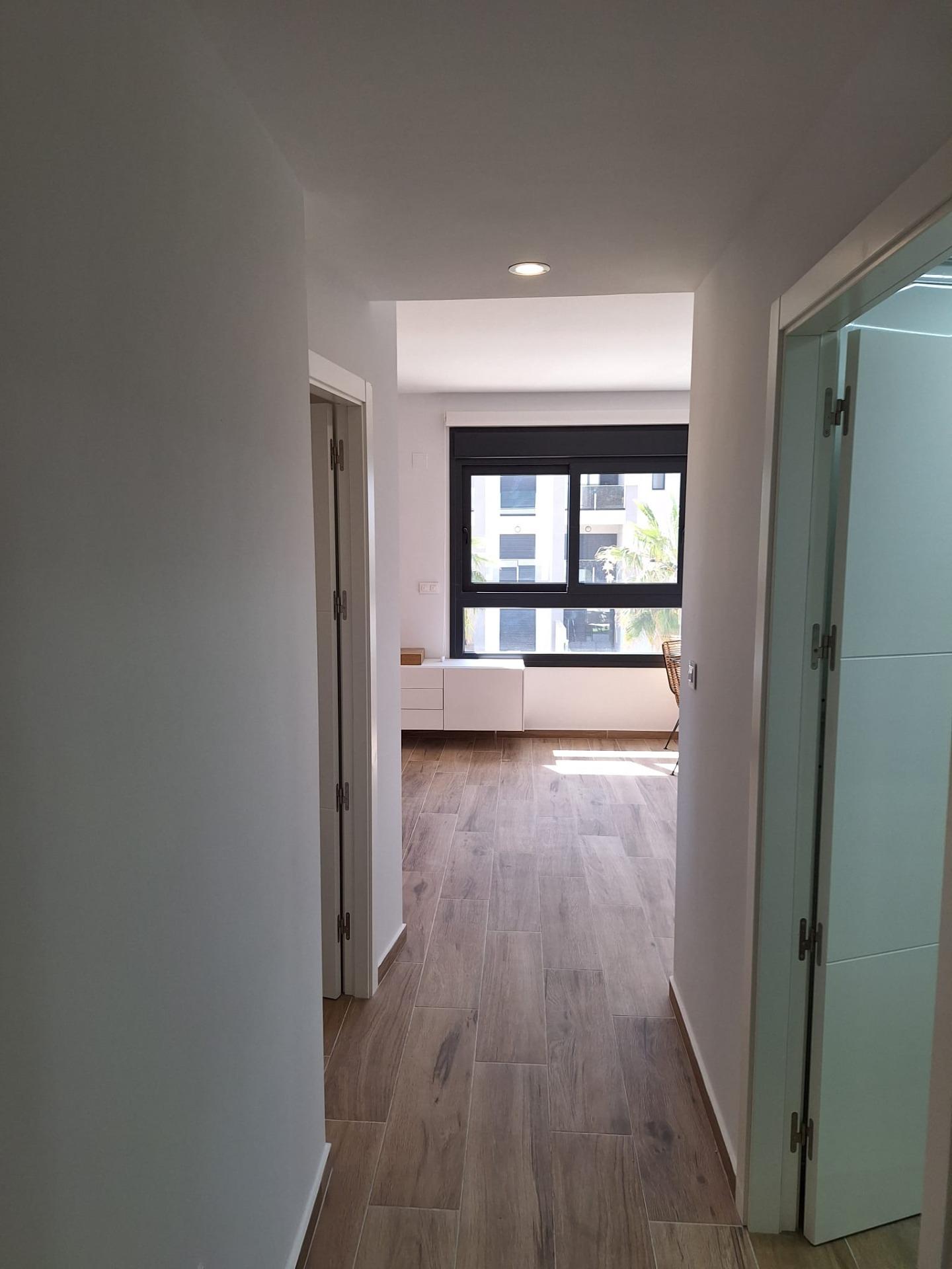 Nieuwbouw appartement in Villamartin met parkeerplaats en gemeenschappelijk zwembad
