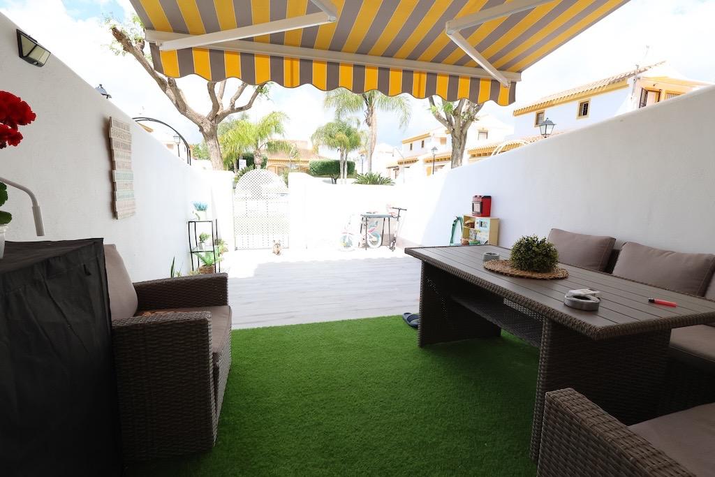 Torre de la Horadada duplex townhouse located directly in front of the communal pool