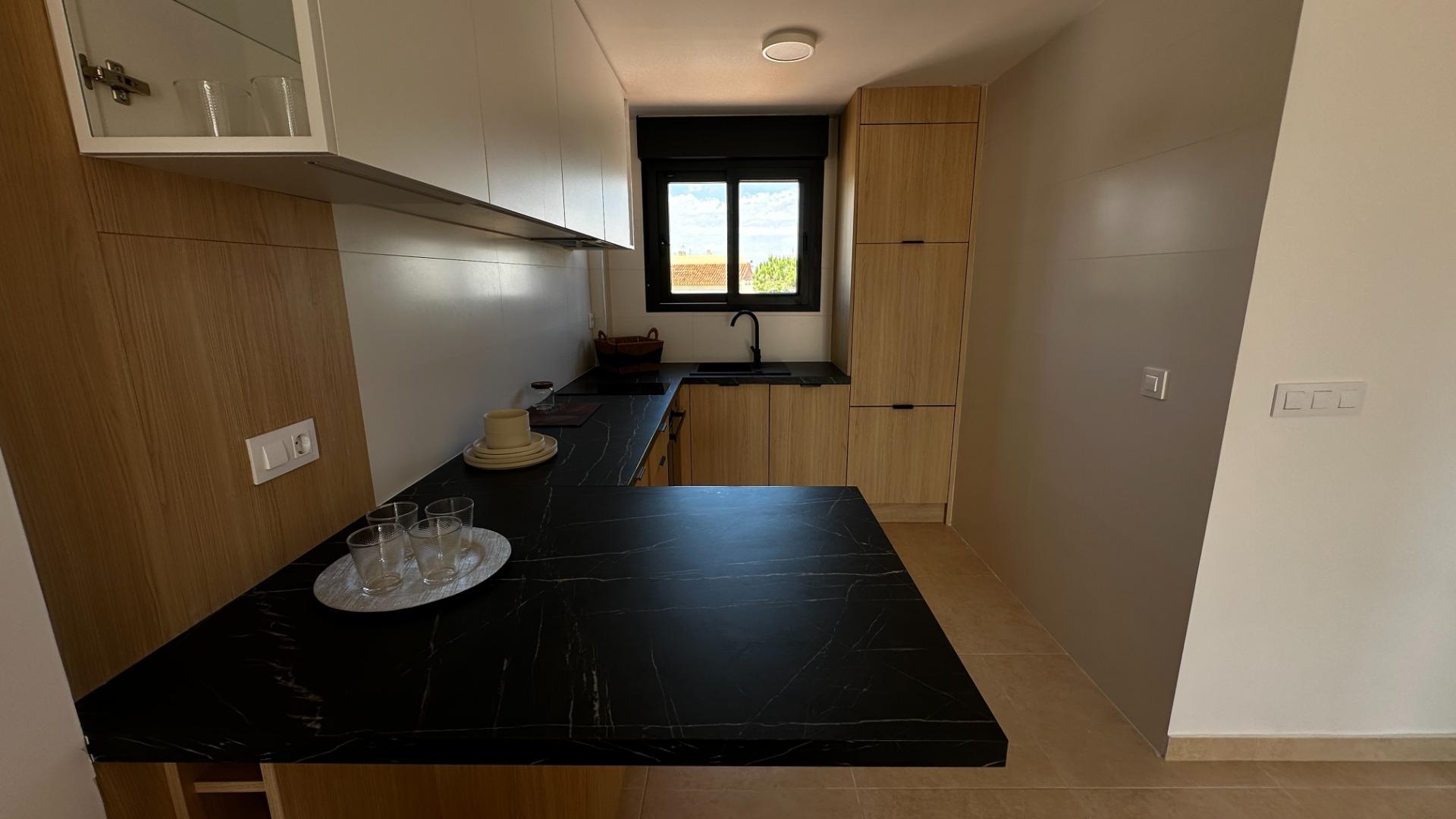 2-3-386 Exclusive townhouses in Oliva Nova: style, comfort, and sea just 500 m away