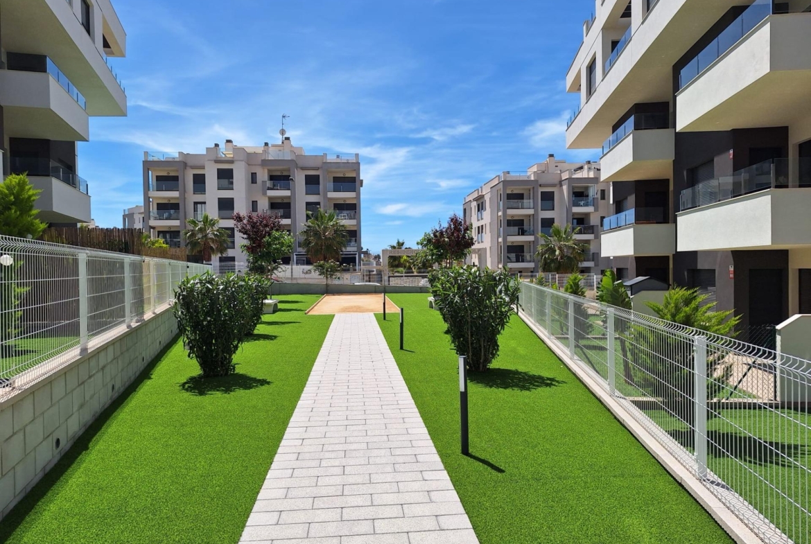 Nieuwbouw appartement in Villamartin met parkeerplaats en gemeenschappelijk zwembad