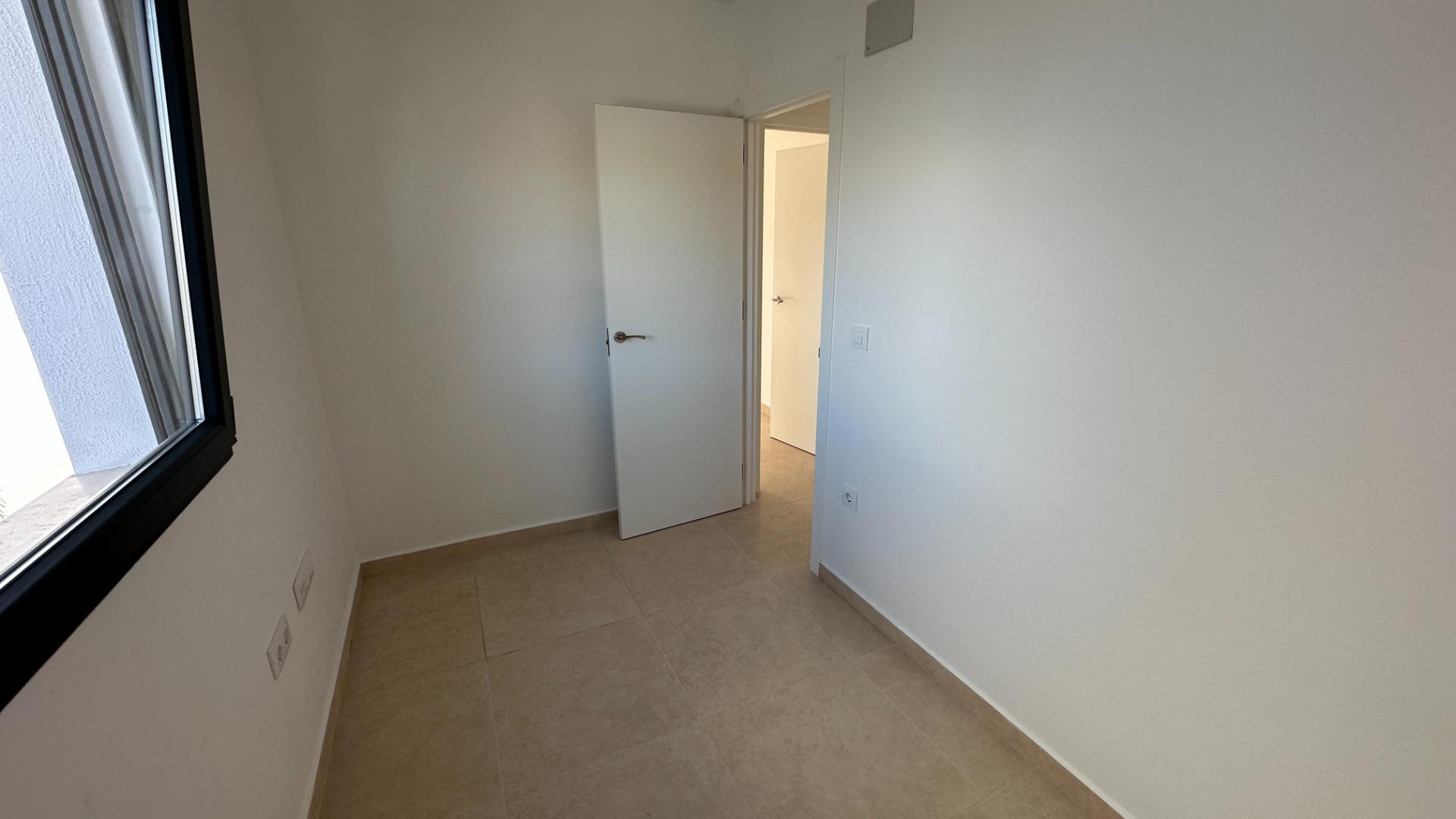 2-35-90 Exclusive townhouses in Oliva Nova: style, comfort, and sea just 500 m away