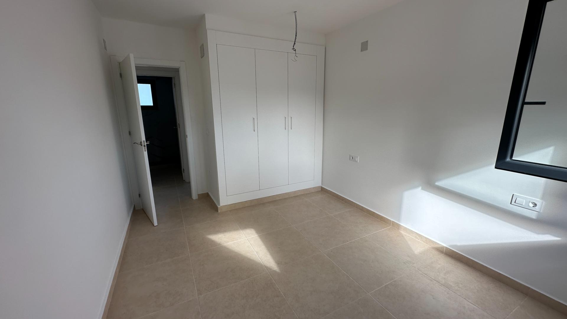 2-38-74 Exclusive townhouses in Oliva Nova: style, comfort, and sea just 500 m away