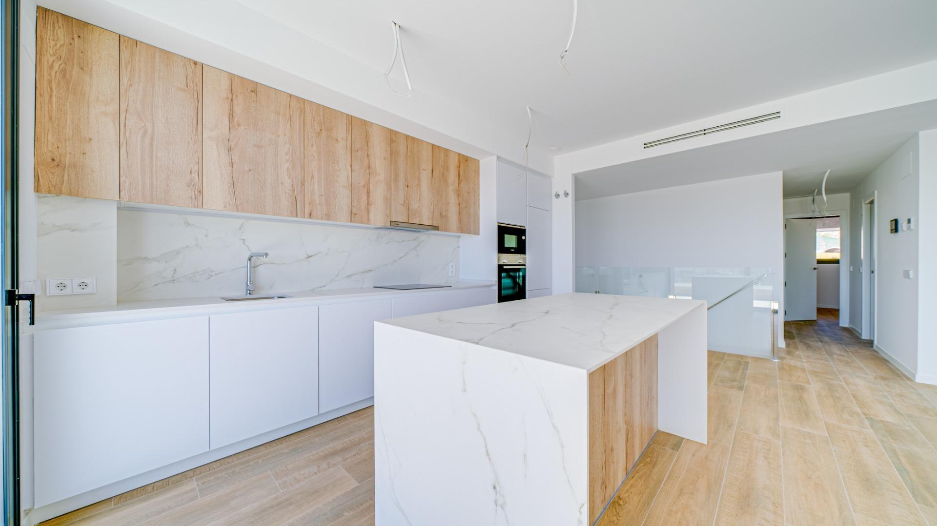 2-4-64 New spacious duplex in Finestrat.