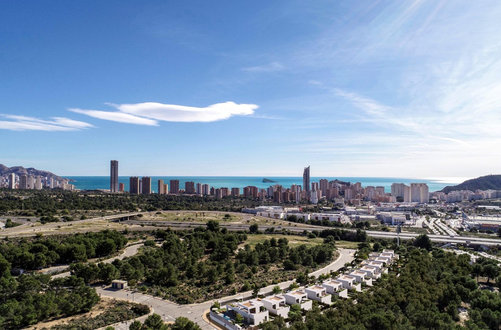 Luxury villas surrounded by green areas and golf courses