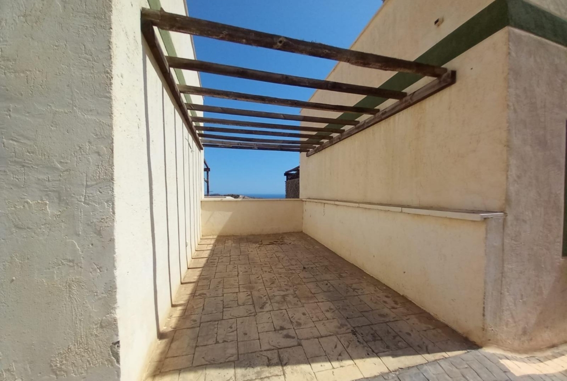 Encantadora Casa Adosada con Impresionantes Vistas al Mar en Balcón de Finestrat