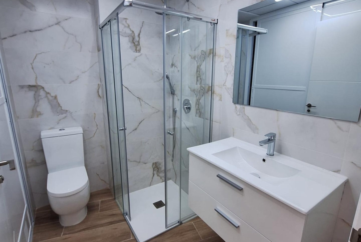 Nieuwbouw appartement in Villamartin met parkeerplaats en gemeenschappelijk zwembad