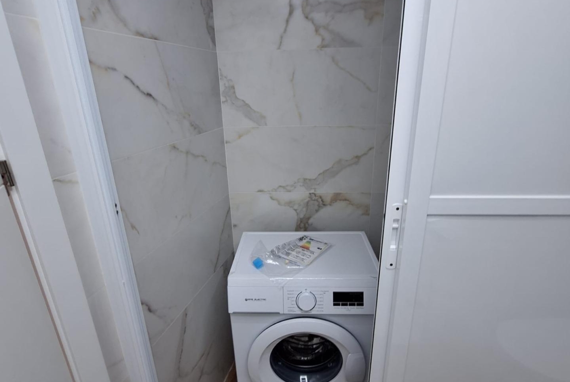 Nieuwbouw appartement in Villamartin met parkeerplaats en gemeenschappelijk zwembad