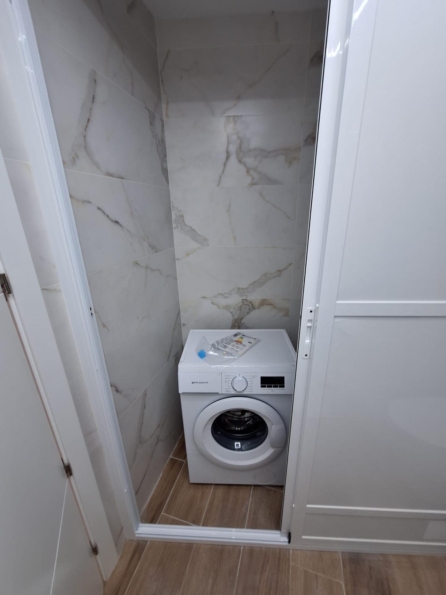 Nieuwbouw appartement in Villamartin met parkeerplaats en gemeenschappelijk zwembad