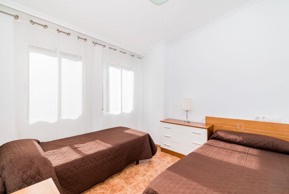 Amplio Apartamento Reformado con piscina comunitaria a 600 metros de la playa del Cura