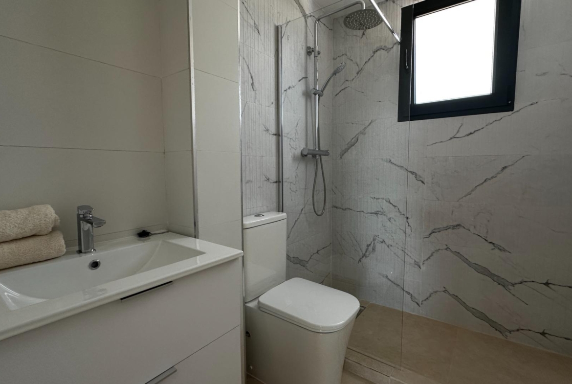Exclusive townhouses in Oliva Nova: style, comfort, and sea just 500 m away
