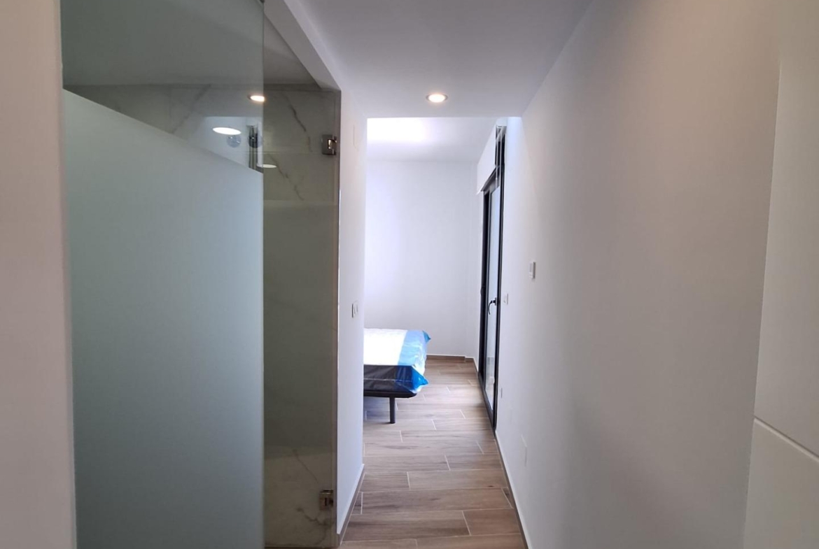 Nieuwbouw appartement in Villamartin met parkeerplaats en gemeenschappelijk zwembad
