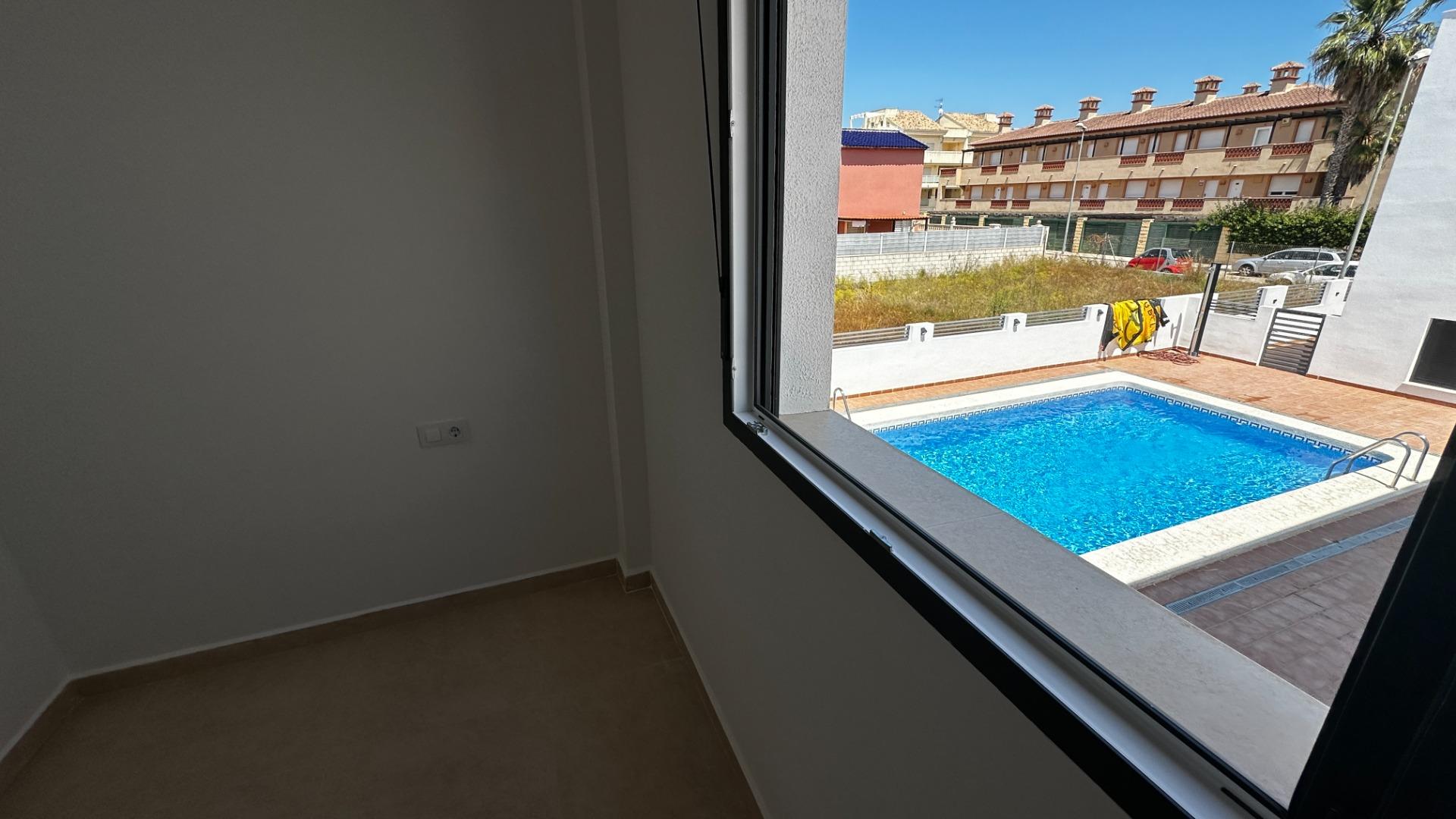 2-8-363 Exclusive townhouses in Oliva Nova: style, comfort, and sea just 500 m away