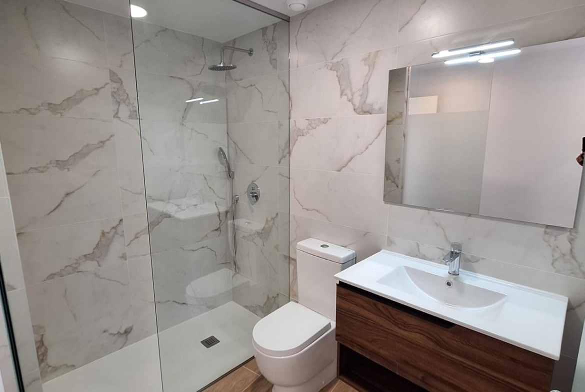 Nieuwbouw appartement in Villamartin met parkeerplaats en gemeenschappelijk zwembad