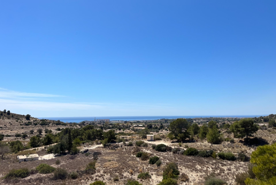 Parcela edificable junto a Puig Campana Golf