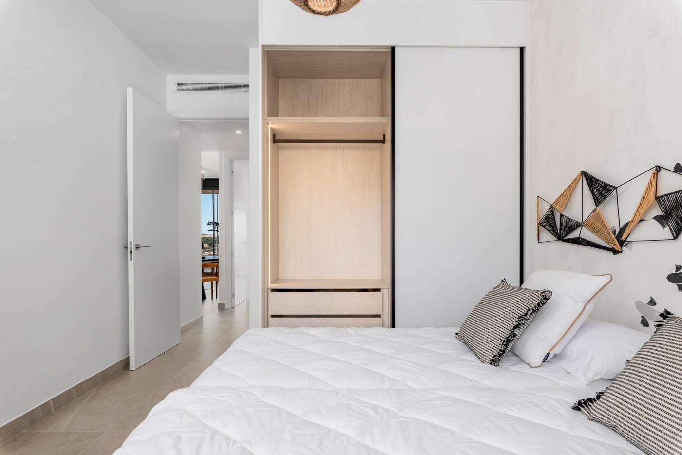 OBRA NUEVA. RESIDENCIAL PRIVADA EN BENIJOFAR. 2 DORM. 2 BAÑOS. TERRAZA 16 M2. PISCINA.