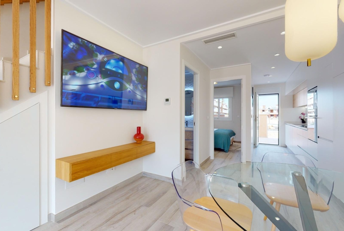 ADOSADOS DE OBRA NUEVA EN PILAR DE LA HORADADA. 3 DORM. 2 BAÑOS. CON PLAZA DE GARAJE Y PISCINA. 83 M2. JARDIN 33 M2. SOLARIUM 34 M2.