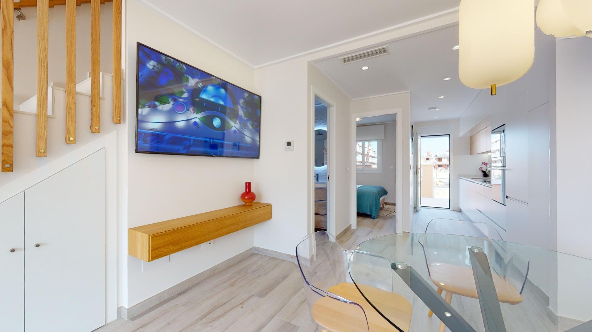4-20-57 ADOSADOS DE OBRA NUEVA EN PILAR DE LA HORADADA. 3 DORM. 2 BAÑOS. CON PLAZA DE GARAJE Y PISCINA. 83 M2. JARDIN 33 M2. SOLARIUM 34 M2.