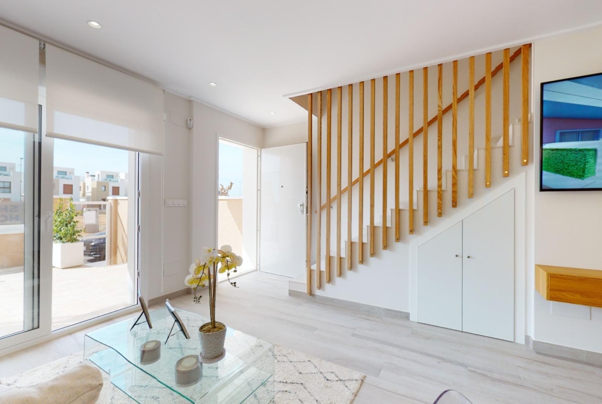 ADOSADOS DE OBRA NUEVA EN PILAR DE LA HORADADA. 3 DORM. 2 BAÑOS. CON PLAZA DE GARAJE Y PISCINA. 83 M2. JARDIN 33 M2. SOLARIUM 34 M2.