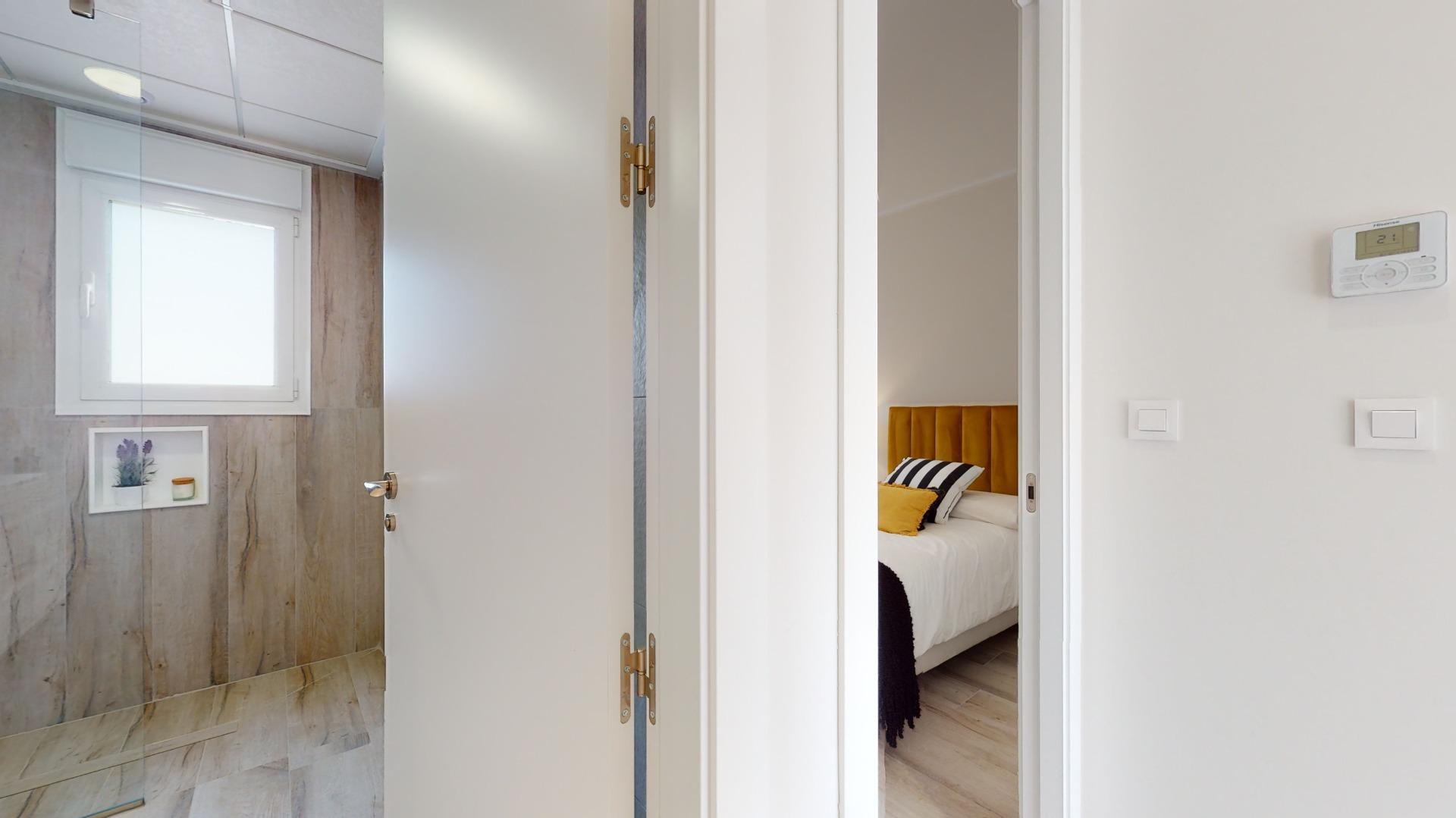 4-23-47 ADOSADOS DE OBRA NUEVA EN PILAR DE LA HORADADA. 3 DORM. 2 BAÑOS. CON PLAZA DE GARAJE Y PISCINA. 83 M2. JARDIN 33 M2. SOLARIUM 34 M2.