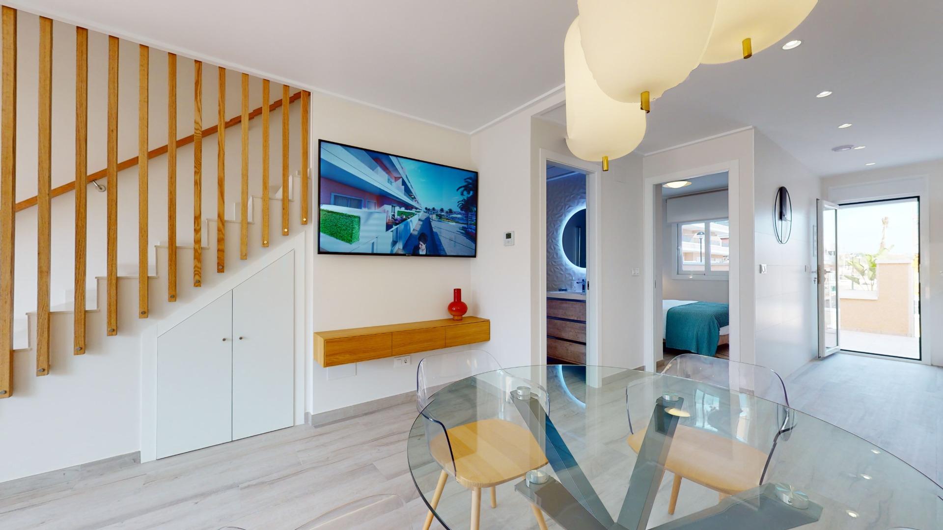 4-37-22 ADOSADOS DE OBRA NUEVA EN PILAR DE LA HORADADA. 3 DORM. 2 BAÑOS. CON PLAZA DE GARAJE Y PISCINA. 83 M2. JARDIN 33 M2. SOLARIUM 34 M2.