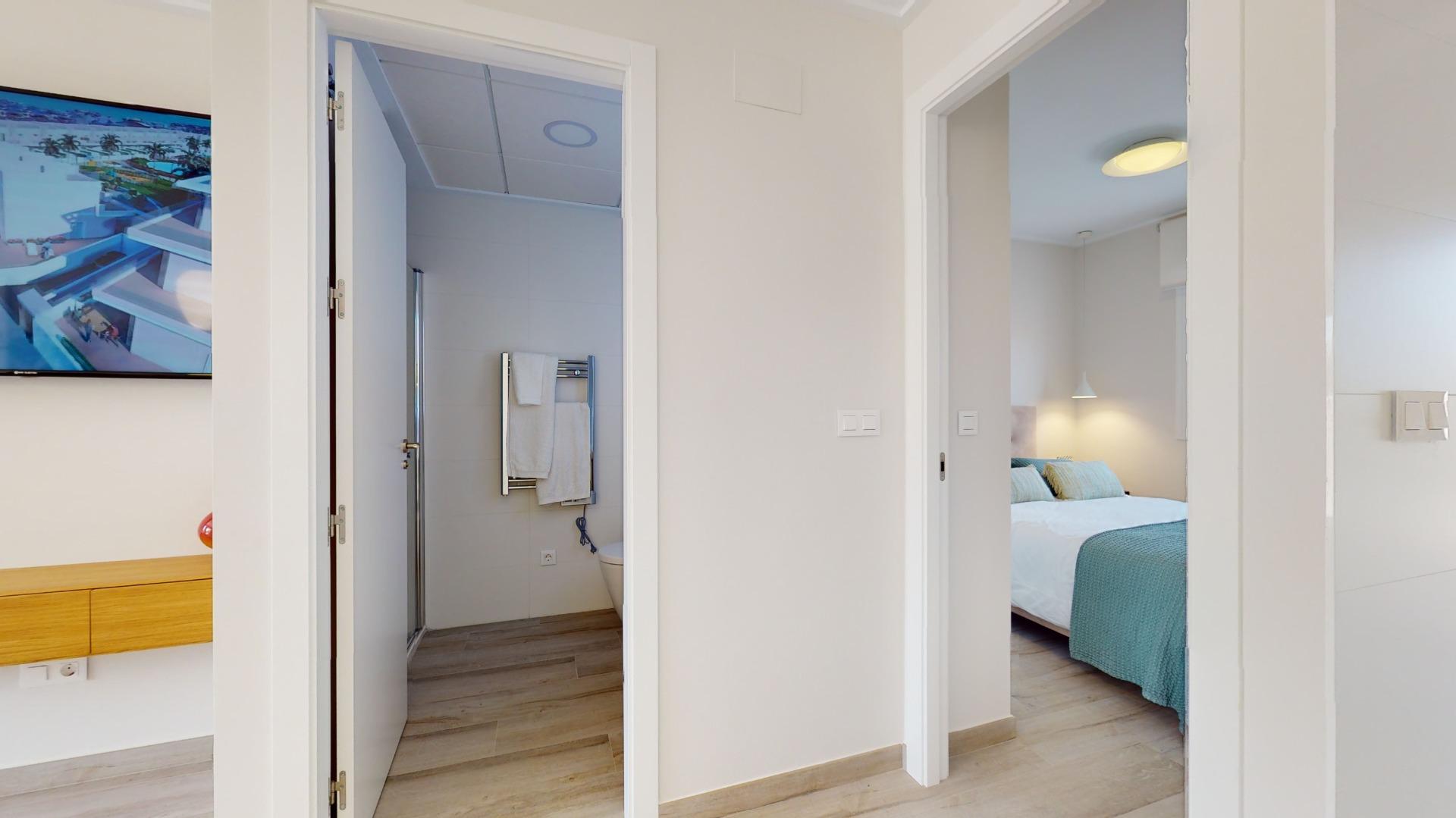 4-39-20 ADOSADOS DE OBRA NUEVA EN PILAR DE LA HORADADA. 3 DORM. 2 BAÑOS. CON PLAZA DE GARAJE Y PISCINA. 83 M2. JARDIN 33 M2. SOLARIUM 34 M2.