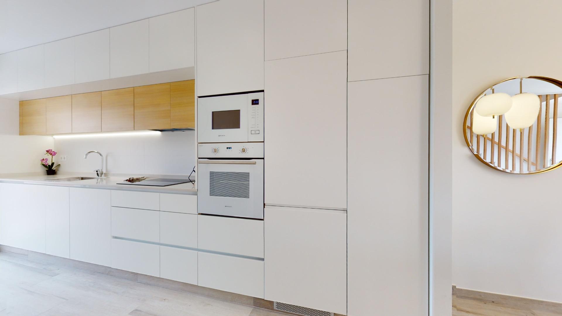 4-45-16 ADOSADOS DE OBRA NUEVA EN PILAR DE LA HORADADA. 3 DORM. 2 BAÑOS. CON PLAZA DE GARAJE Y PISCINA. 83 M2. JARDIN 33 M2. SOLARIUM 34 M2.