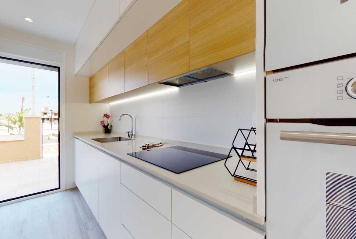 ADOSADOS DE OBRA NUEVA EN PILAR DE LA HORADADA. 3 DORM. 2 BAÑOS. CON PLAZA DE GARAJE Y PISCINA. 83 M2. JARDIN 33 M2. SOLARIUM 34 M2.
