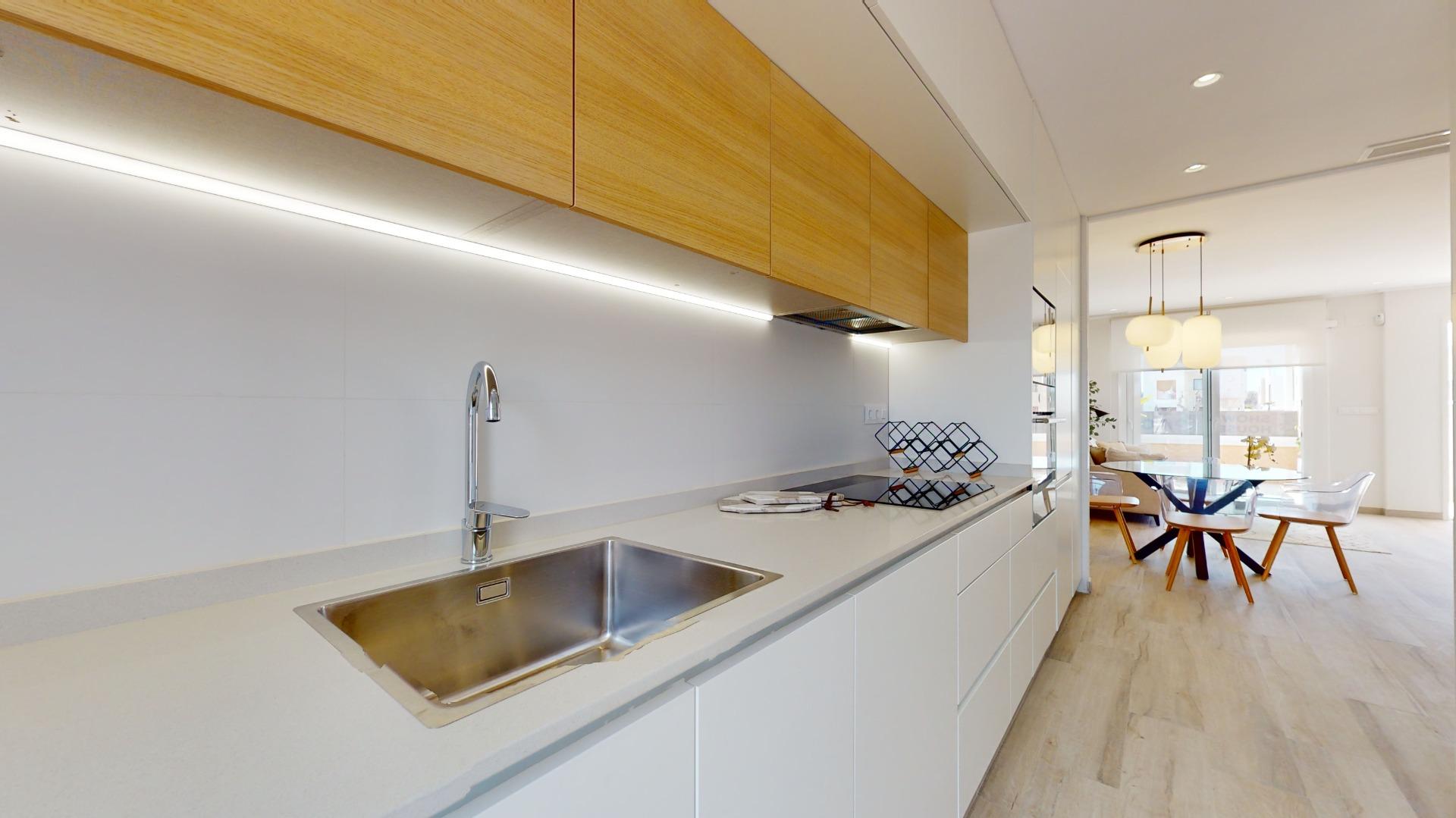 4-50-12 ADOSADOS DE OBRA NUEVA EN PILAR DE LA HORADADA. 3 DORM. 2 BAÑOS. CON PLAZA DE GARAJE Y PISCINA. 83 M2. JARDIN 33 M2. SOLARIUM 34 M2.