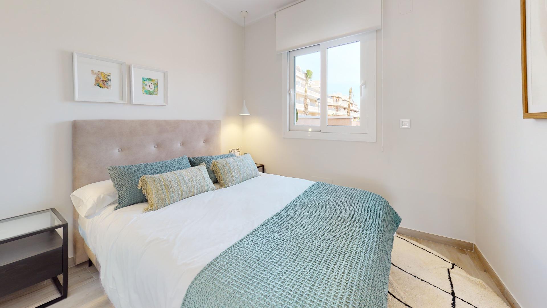 4-83-4 ADOSADOS DE OBRA NUEVA EN PILAR DE LA HORADADA. 3 DORM. 2 BAÑOS. CON PLAZA DE GARAJE Y PISCINA. 83 M2. JARDIN 33 M2. SOLARIUM 34 M2.