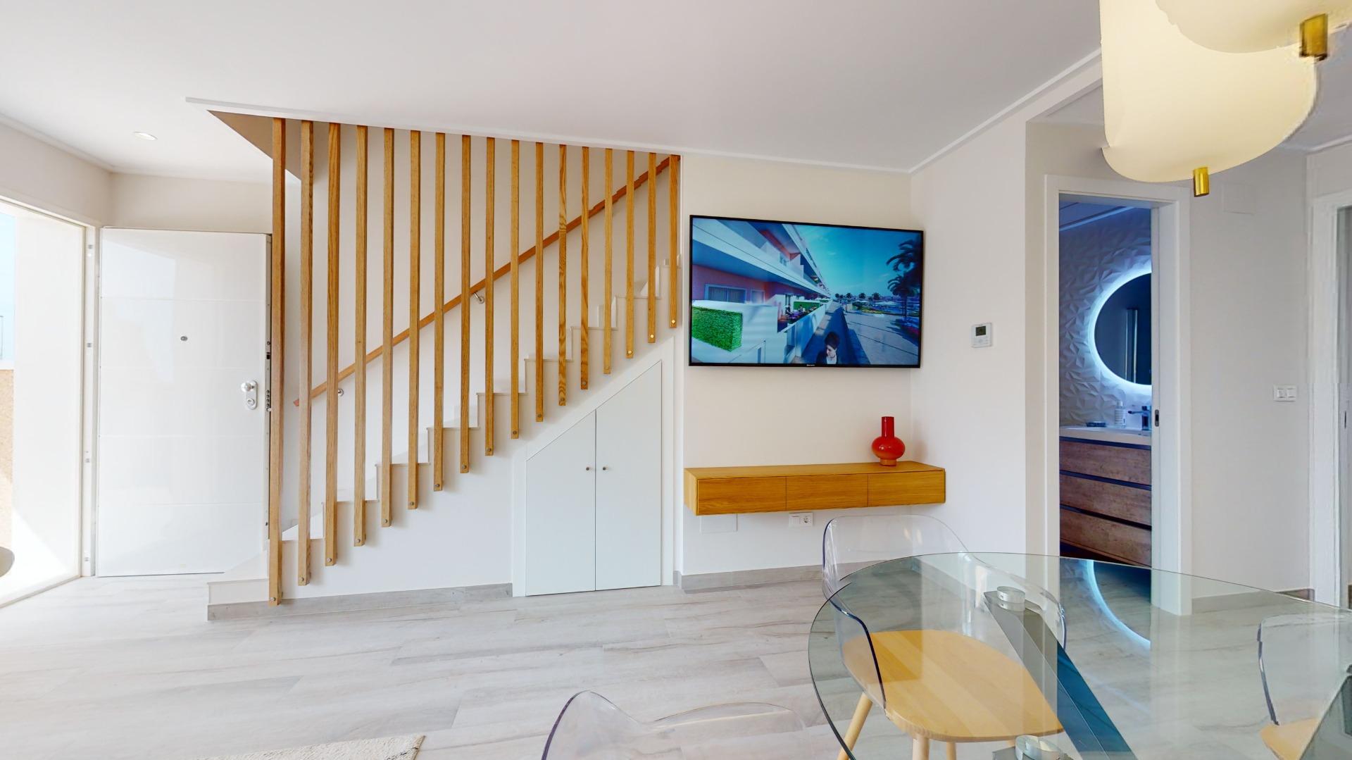 4-86-3 ADOSADOS DE OBRA NUEVA EN PILAR DE LA HORADADA. 3 DORM. 2 BAÑOS. CON PLAZA DE GARAJE Y PISCINA. 83 M2. JARDIN 33 M2. SOLARIUM 34 M2.